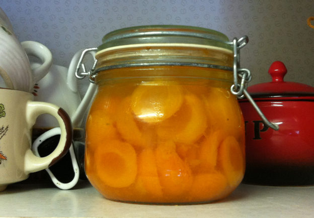 Apricots bottled in syrup